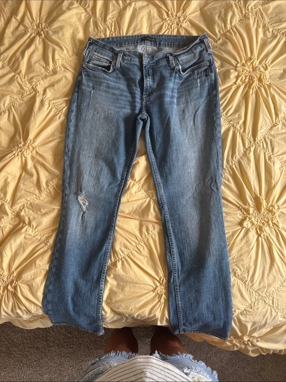 Silver Jeans Light Blue Straight Leg Jeans with Distressed Detail